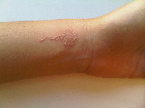 white ink minimalist tattoos