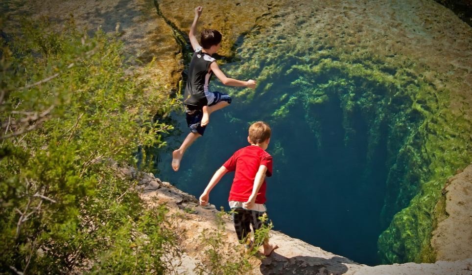 This Mysterious & Dangerous Swimming Hole In Texas Hides Some Very Dark ...