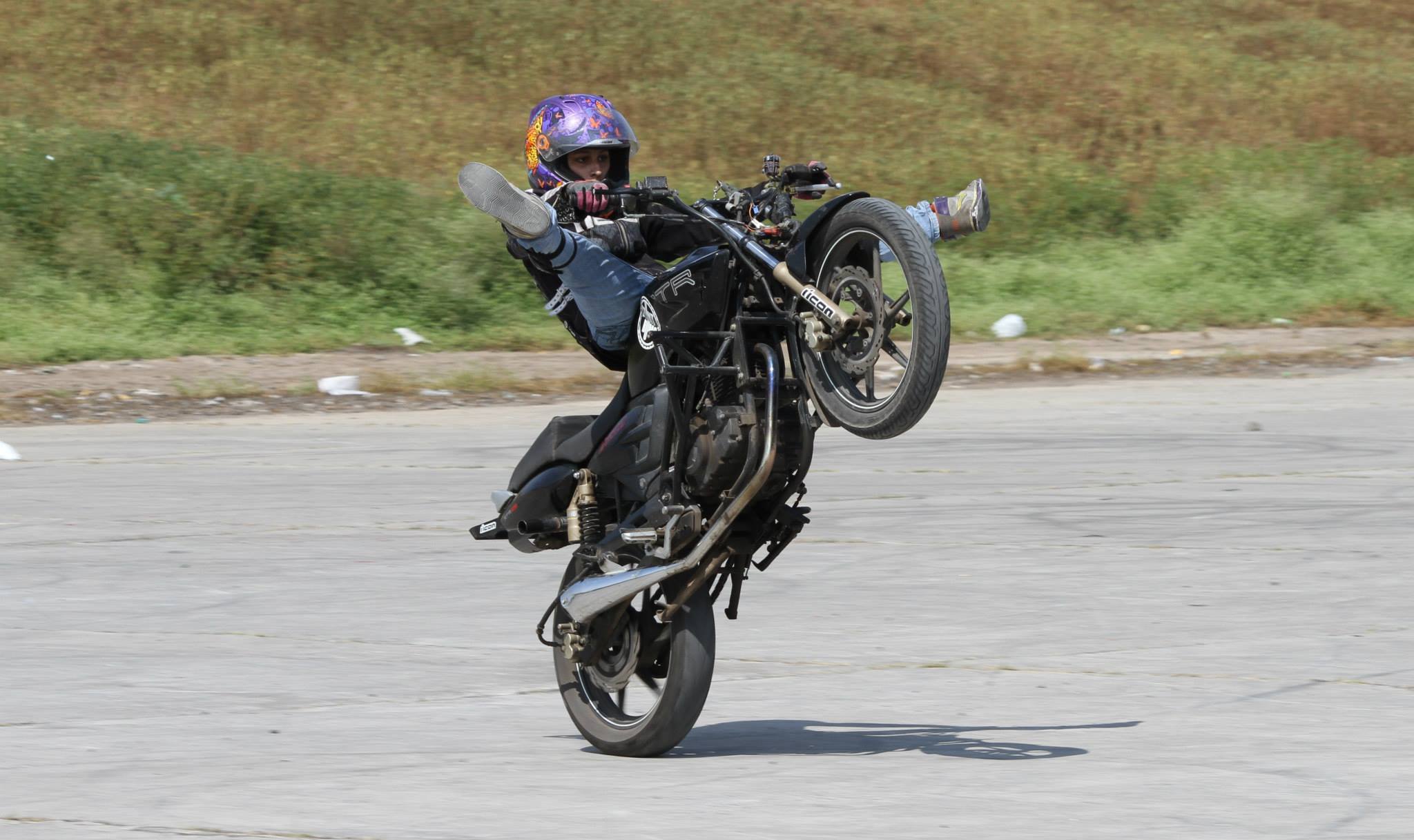 girl bike stunt