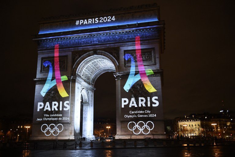 Stunning Photos From Paris As Arc De Triomphe Lights Up With Olympics ...